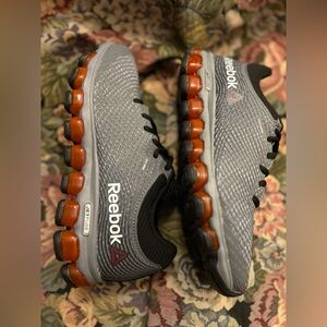 REEBOK JETFUSE Gray and Black Athletic Shoes with Orange Accents